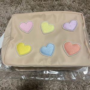 Stoney Clover Lane large pouch with 6 hearts patches